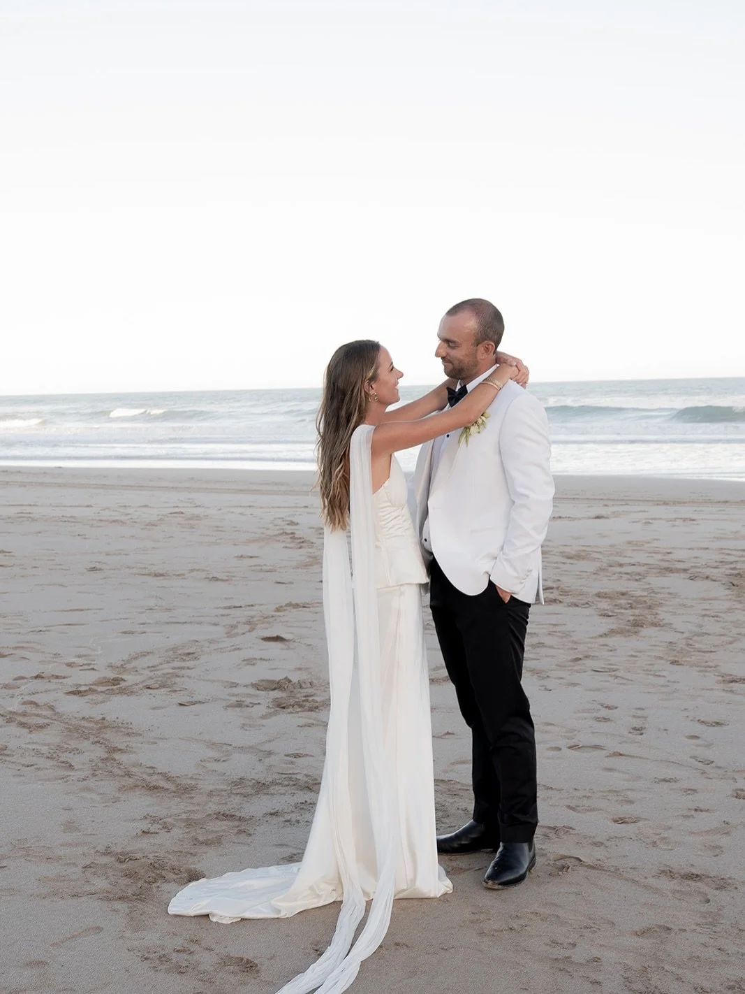 What a way to spend a long weekend 🤍 Back in their family home town, J&amp;G tied the knot in the hills and celebrated on the beach at the local surf club. 

@field0froses
@amourweddings 
@lulujacksonbridal
@bond_and_co
@cassieharpermakeup
@jordylea