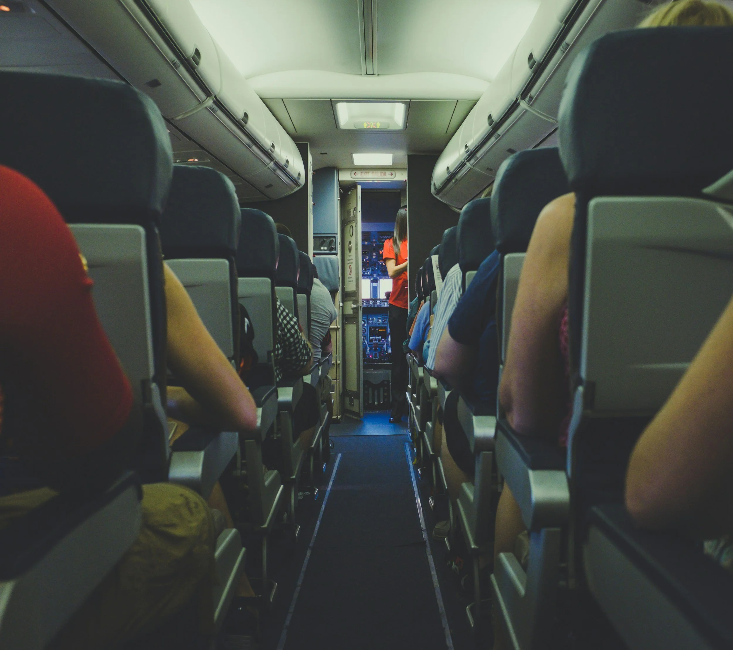 An image of airplane passengers representing fear of flying and available treatment at Austin Anxiety and OCD Specialists