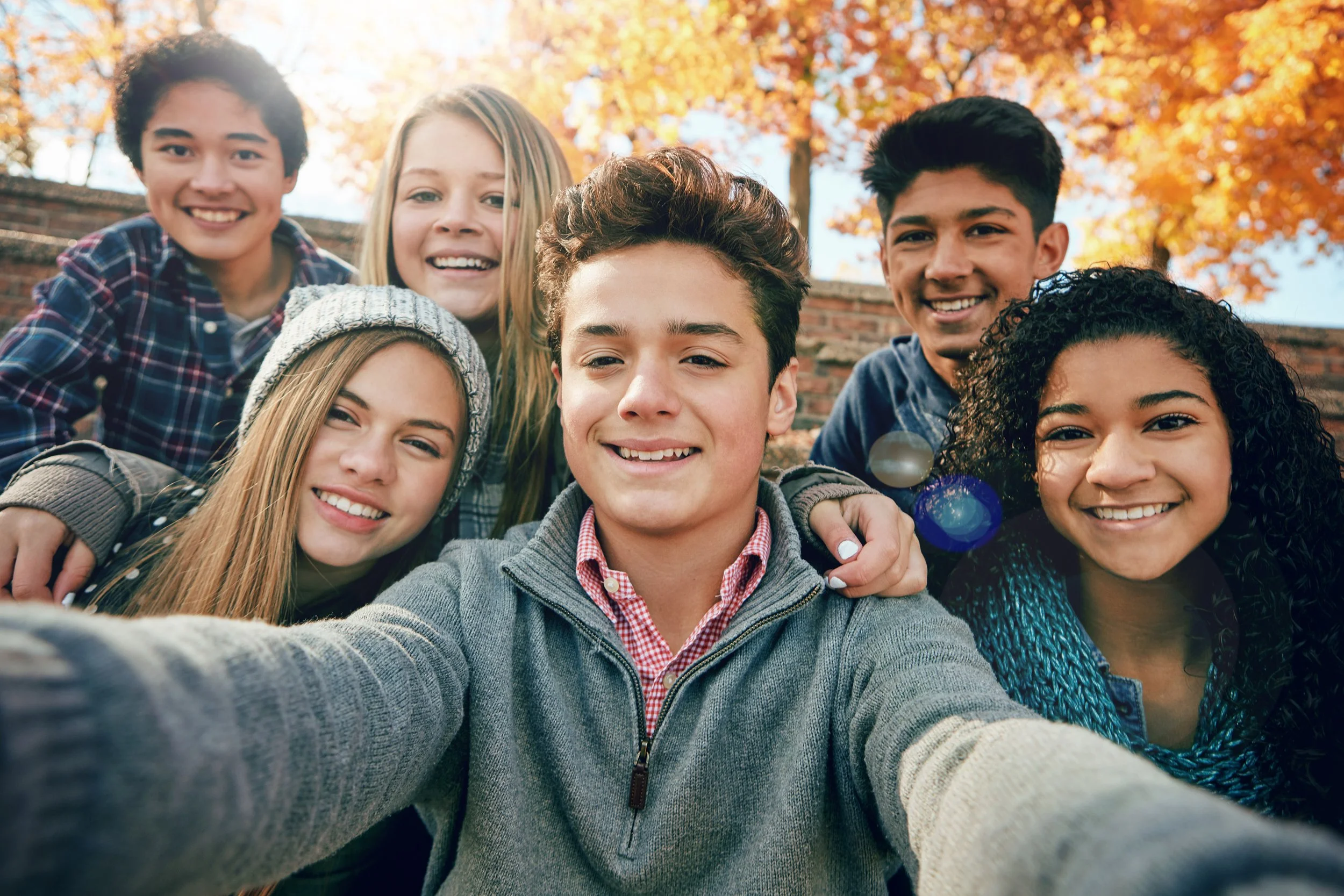 Image of happy teens symbolizing positive therapy outcome for OCD and anxiety in Austin Texas