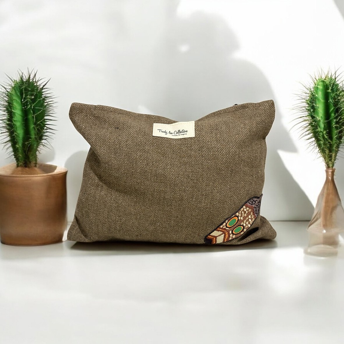 Brown with western feather wool blend.jpg
