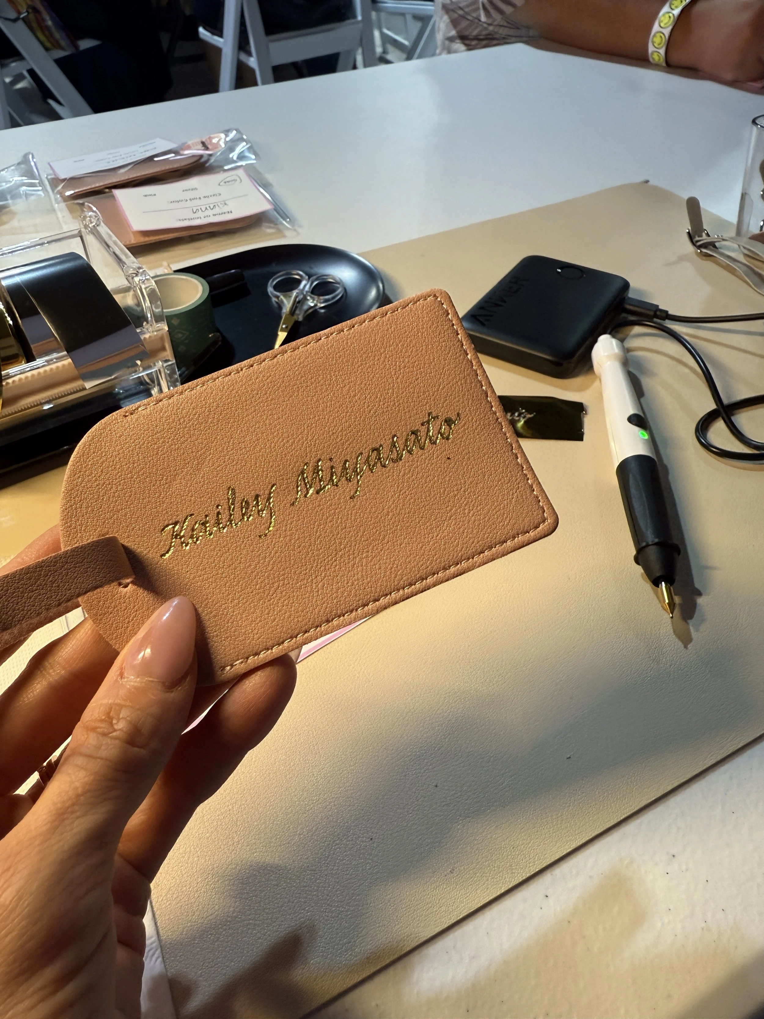 Live-leather-luggage-tag-personalization-hawaii-grad-party-activation7.JPG