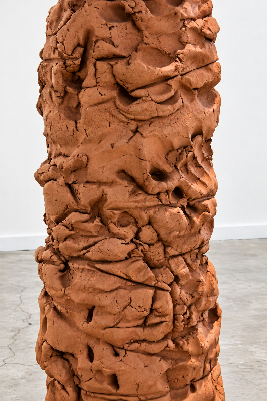 Terracotta Column in Minimalist Gallery.png