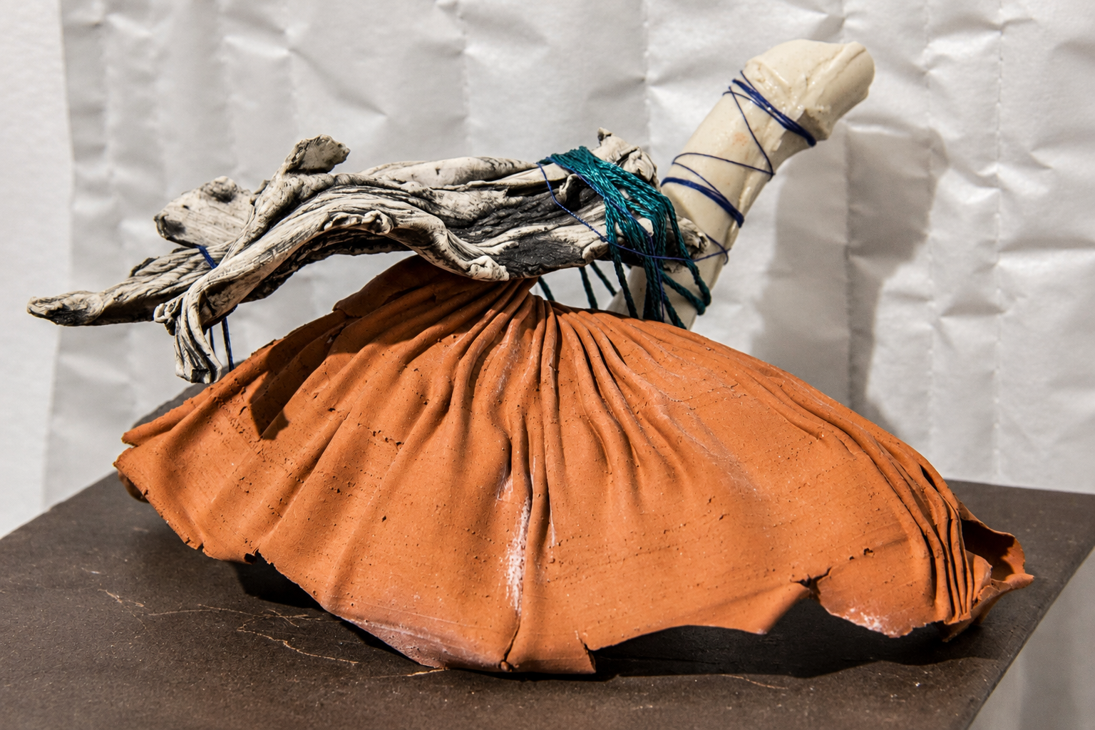 interchange . 2016 . ceramic, thread, batting, parchment paper, upholstery tacks