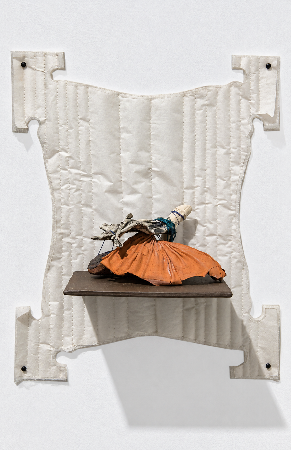 interchange . 2016 . ceramic, thread, batting, parchment paper, upholstery tacks