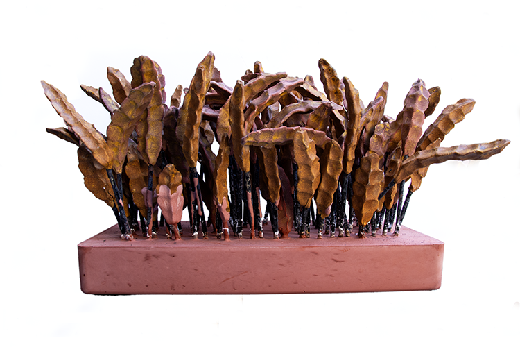 Parcel. 2024. Clay, red iron oxide, rutile, hydrostone. 12x8x8 in.