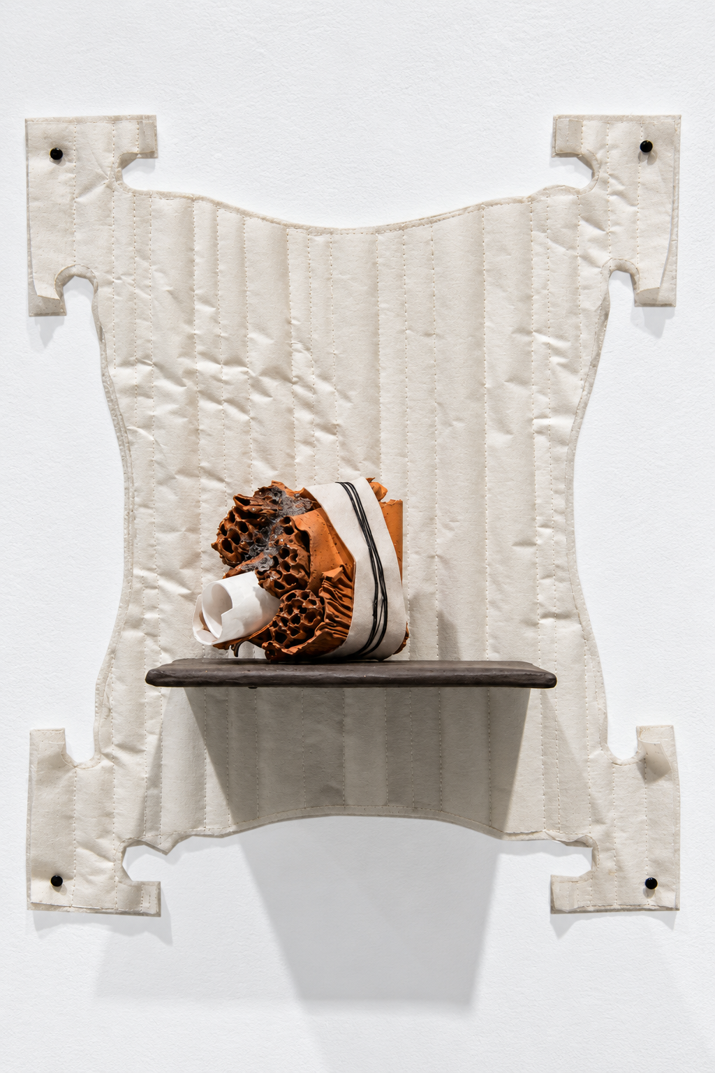 interchange . 2016 . ceramic, thread, Poly-Fil, batting, parchment paper, upholstery tacks