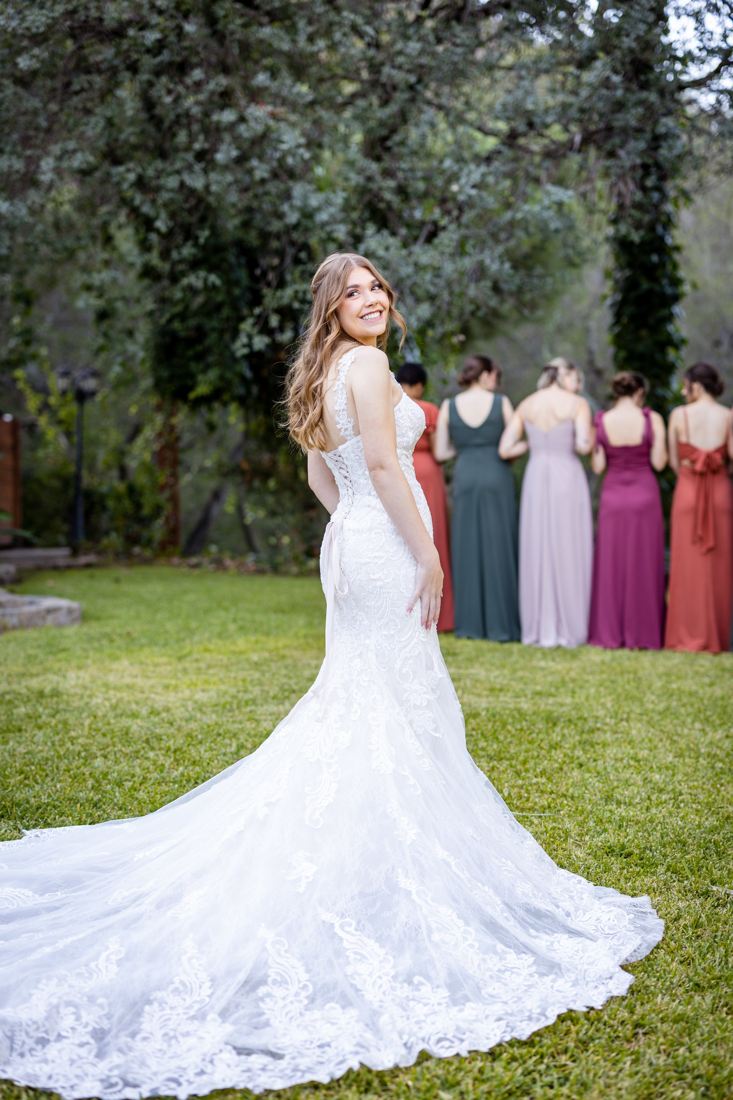 First look with bridesmaids at Secluded Garden Estate