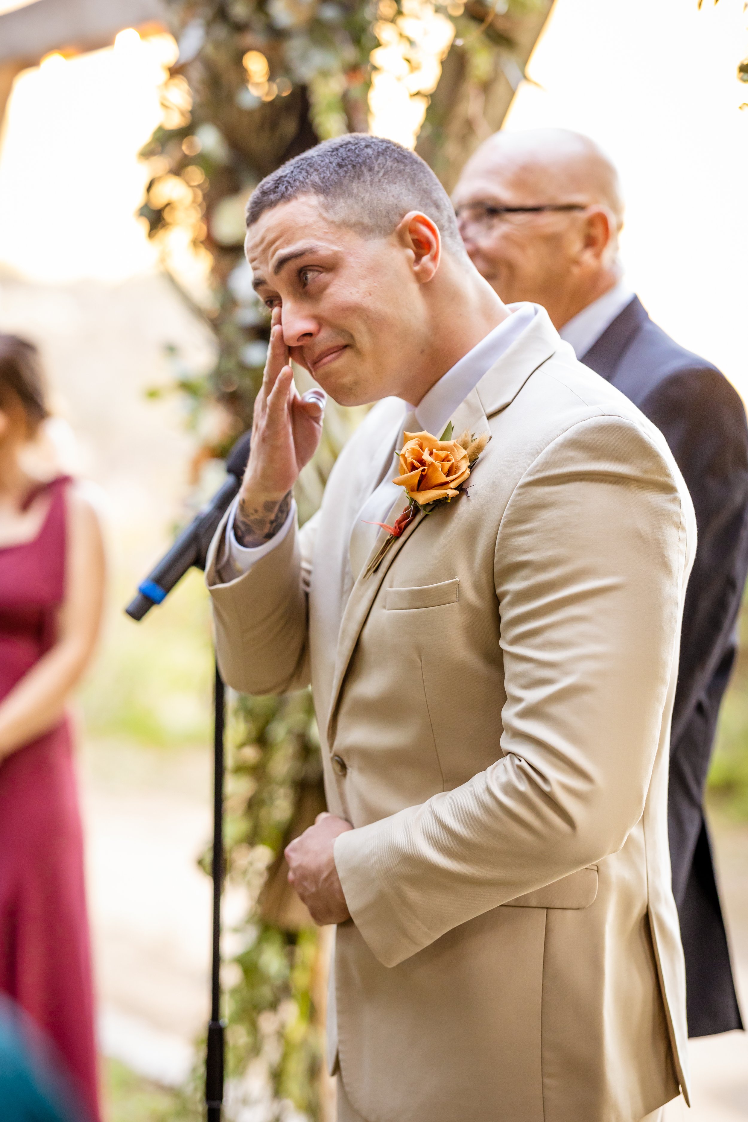 groom reaction to bride walking down the aisle crying in Temecula