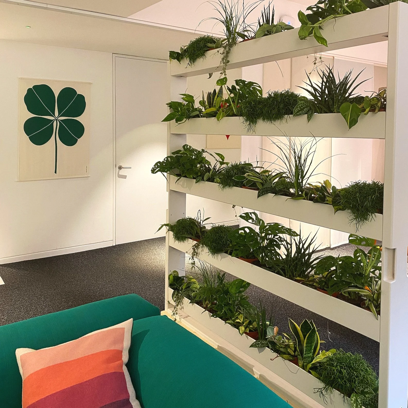 A planted room divider for the office and showroom of design brand Vitra in Clerkenwell, London.