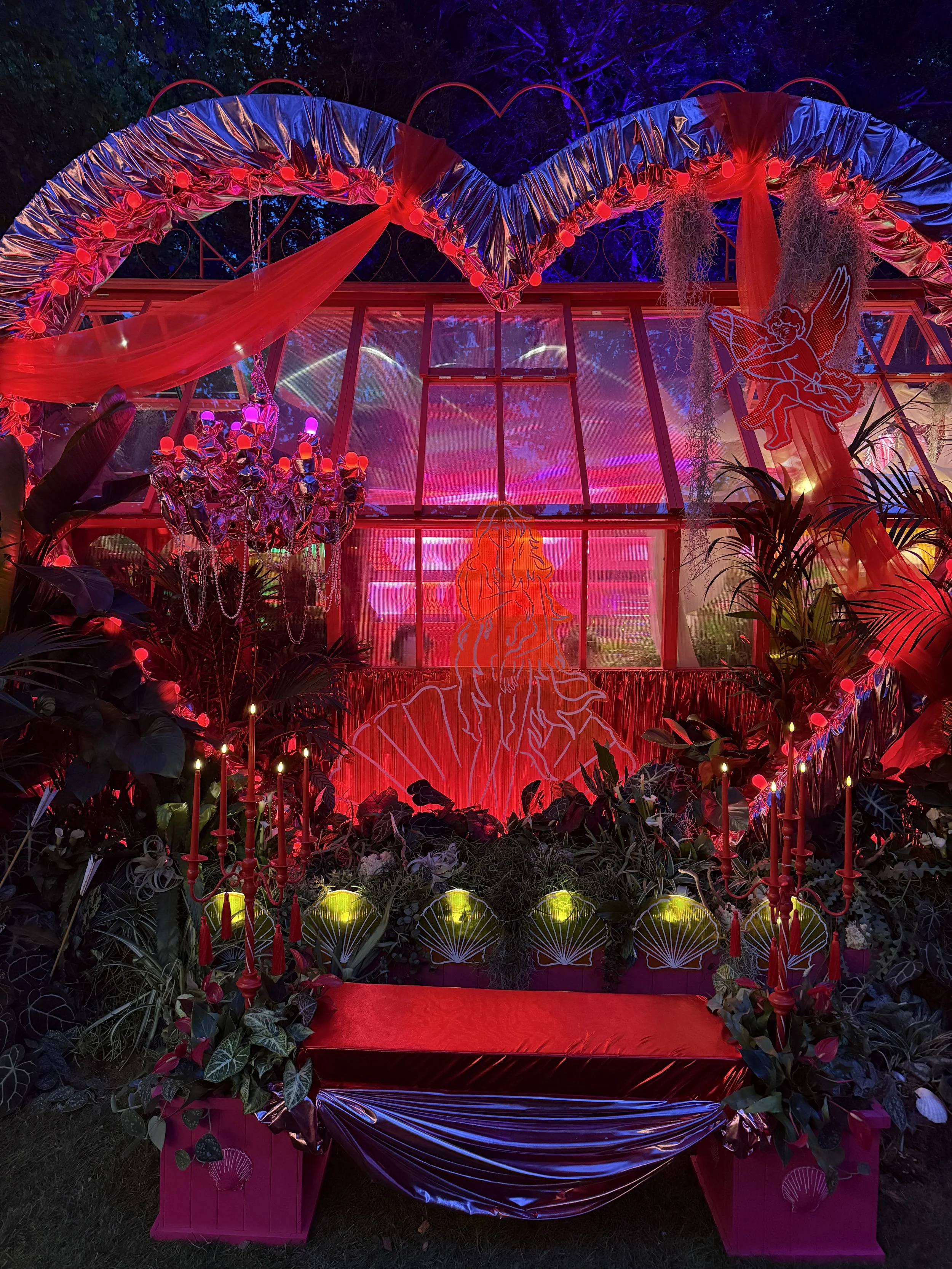 Lovehoney Presents: Aphrodite's Hothouse at night at RHS Chelsea Flower Show 2026 - Houseplant Studio designed by James Whiting of Plants By There