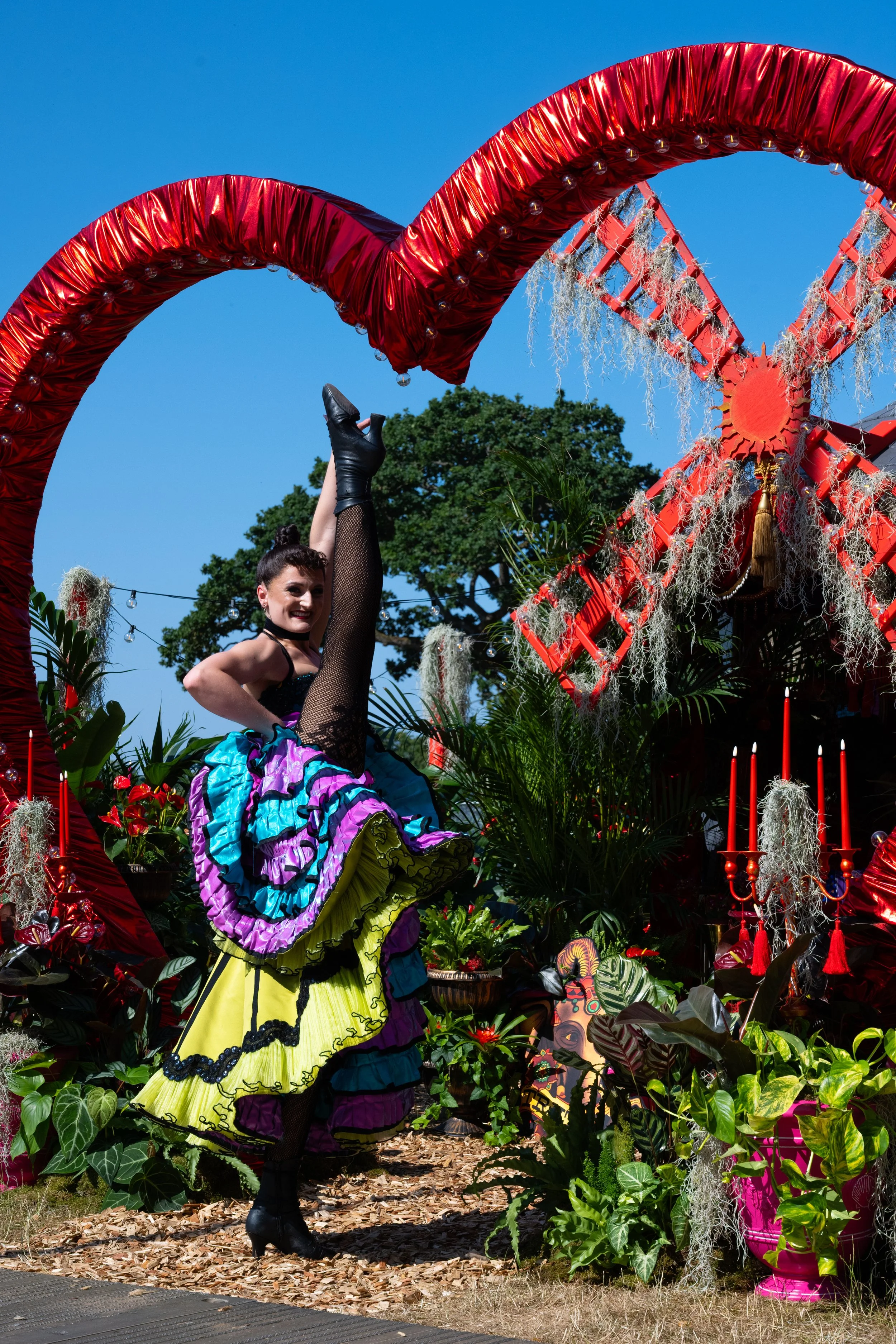 Cast member Catrin Thomas on L'amour Vert for Moulin Rouge! The Musical at RHS Badminton Flower Show 2026 Designed by James Whiting and Plants By There - RHS Gold Medal and Best Houseplant Terrarium