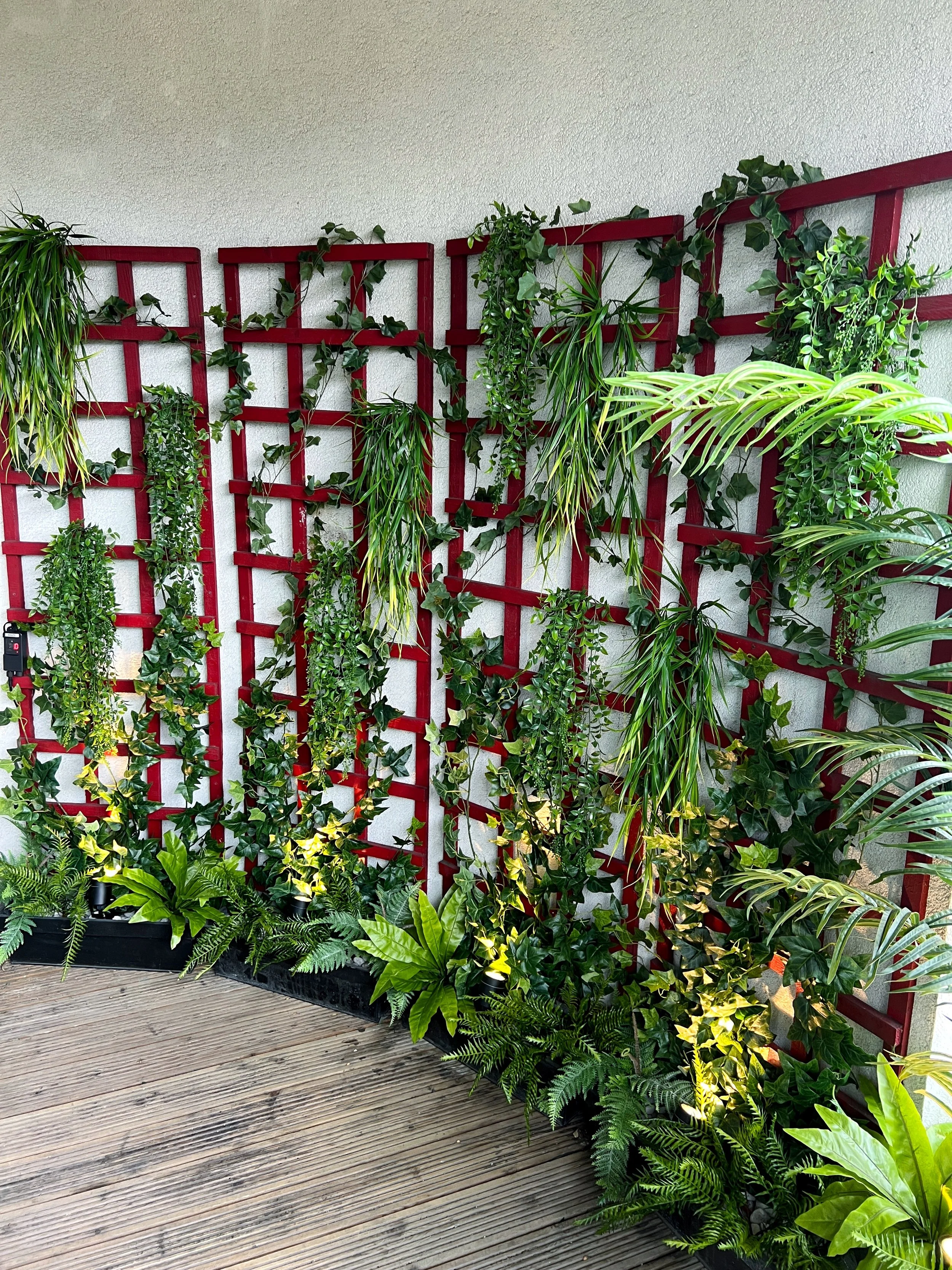 Vertical planting with artificial plants - London low maintenance balcony gardening