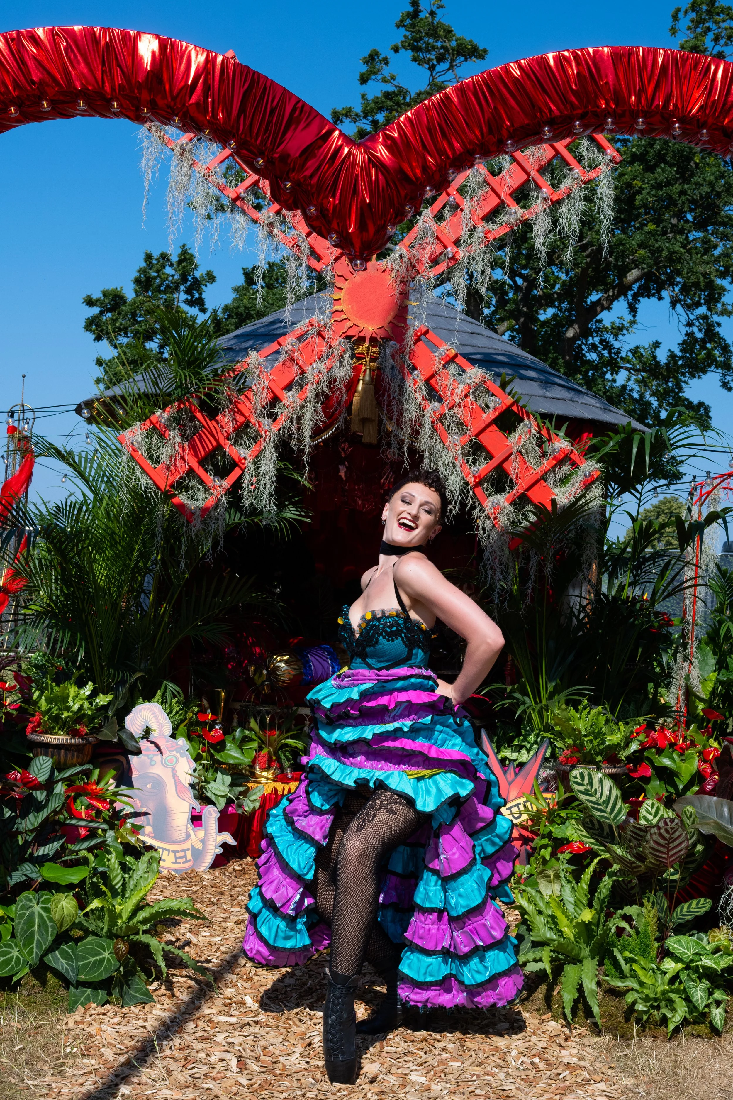 Cast member Catrin Thomas on L'amour Vert for Moulin Rouge! The Musical at RHS Badminton Flower Show 2026 Designed by James Whiting and Plants By There - RHS Gold Medal and Best Houseplant Terrarium
