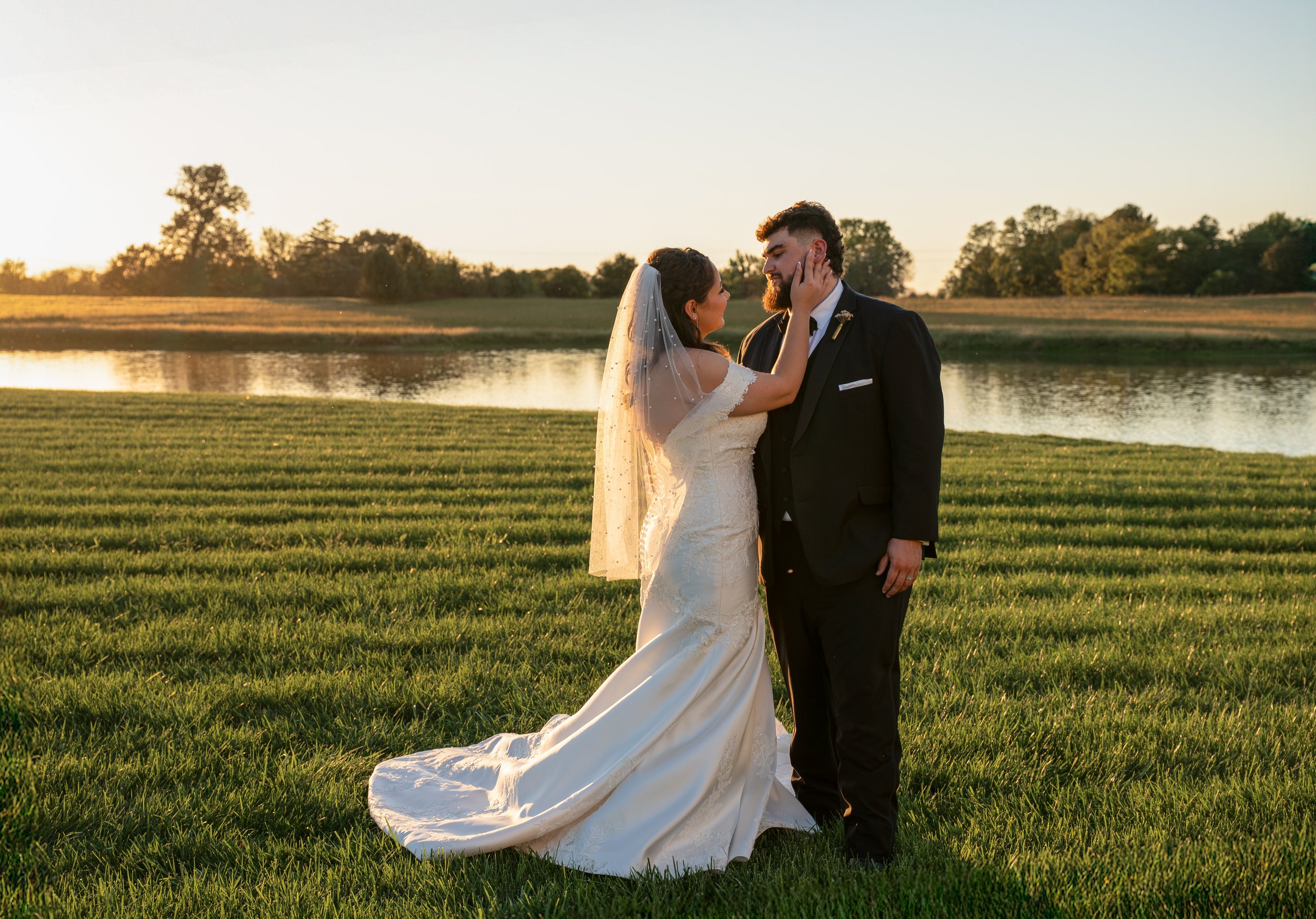 Bride and groom portrait at sunset after wedding ceremony at the Commonwealth Event Center in Paducah Kentucky