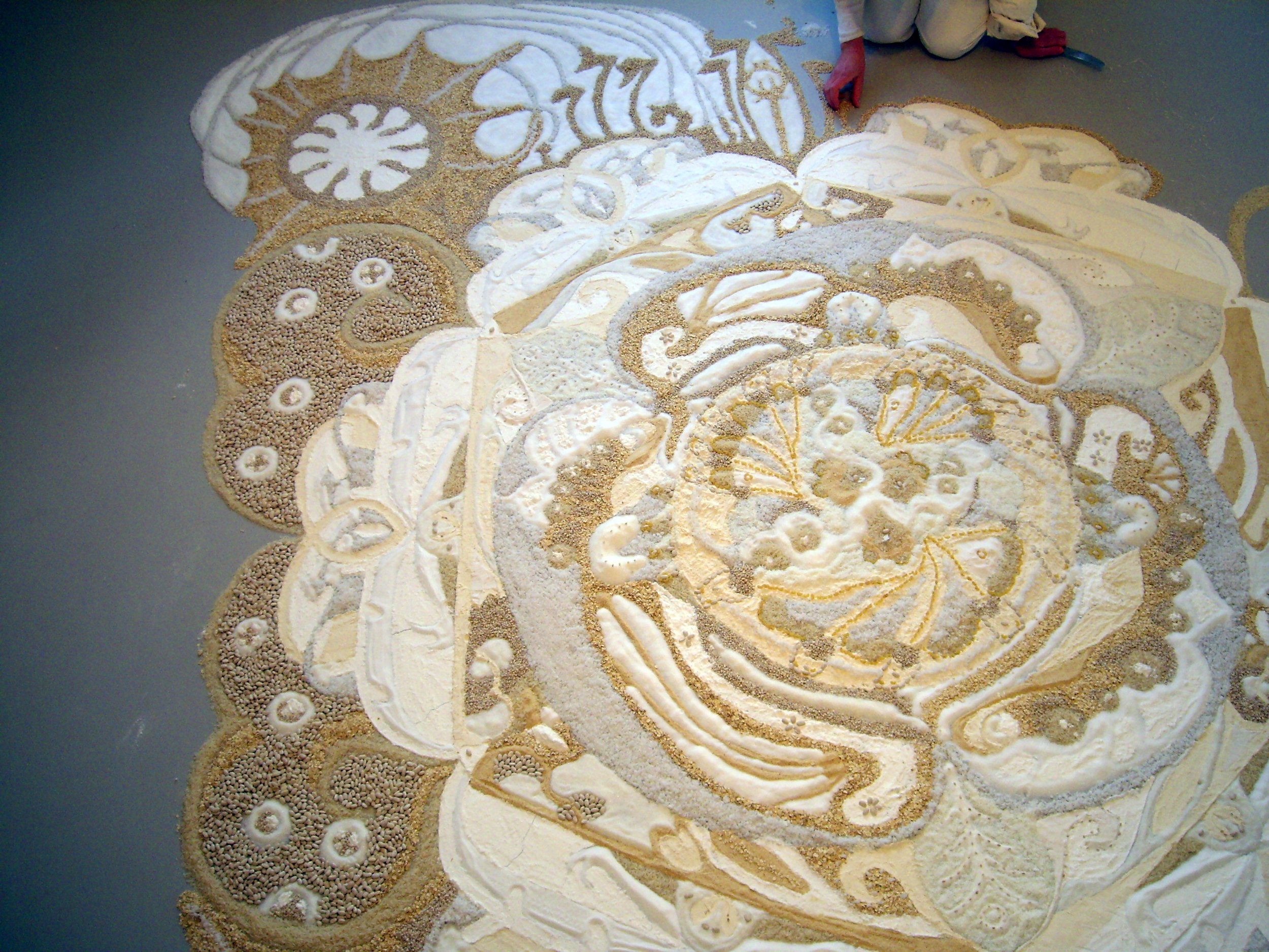 Mandala out of white foodstuff.
Photo by: Simo Saarikoski