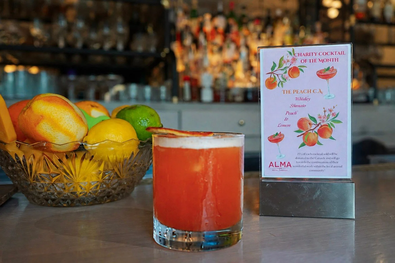 In honor of National Cat Day, order Alma's Charity Cocktail: the Peach C. A. 🐾 

Featuring a balance of Whiskey, Sfumato, peach, and lemon, 25% of each cocktail purchased will benefit @thecatcade! Available all month long 🥂