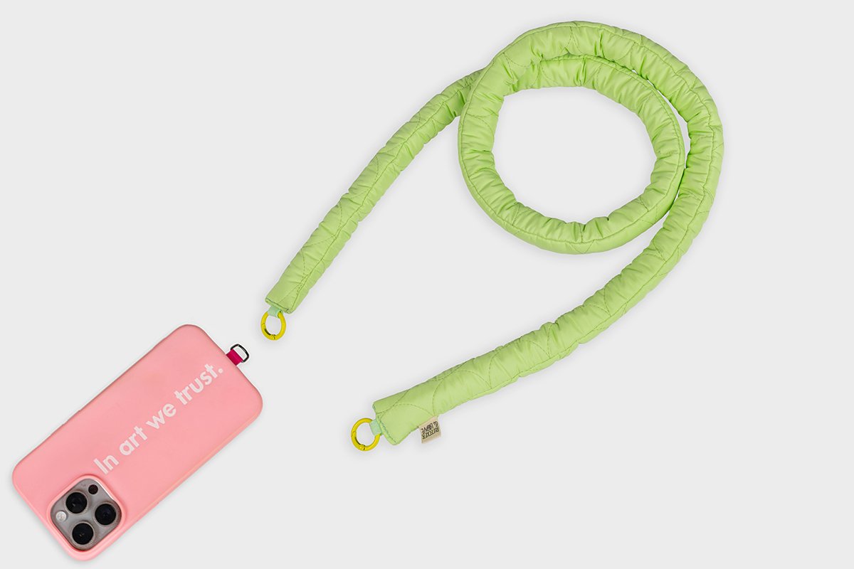 PISTACHIO phone strap w phone.jpg