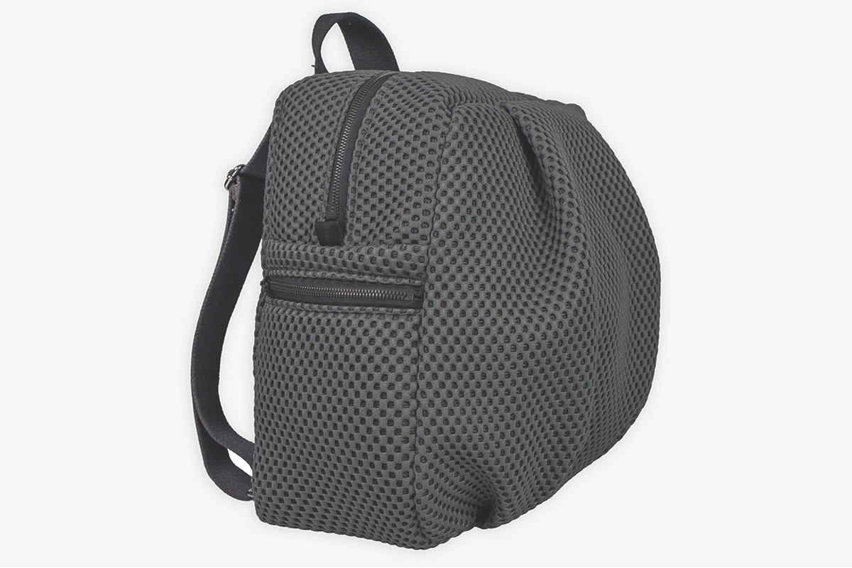SHAKA GREY backpack side light.jpg