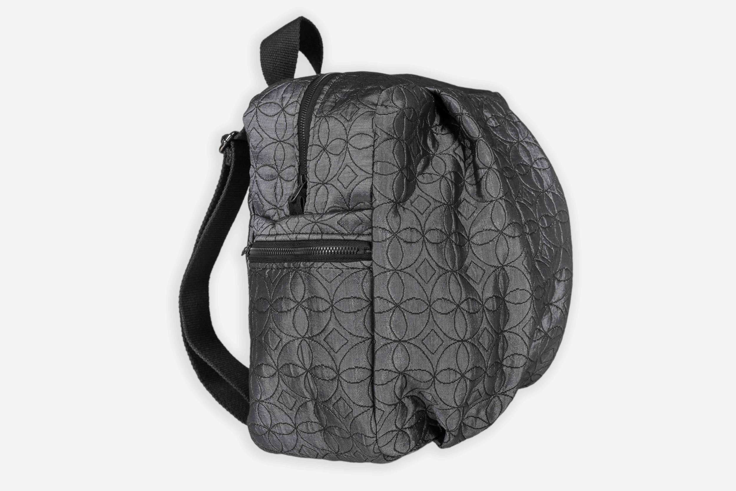 NEVE backpack side.jpg