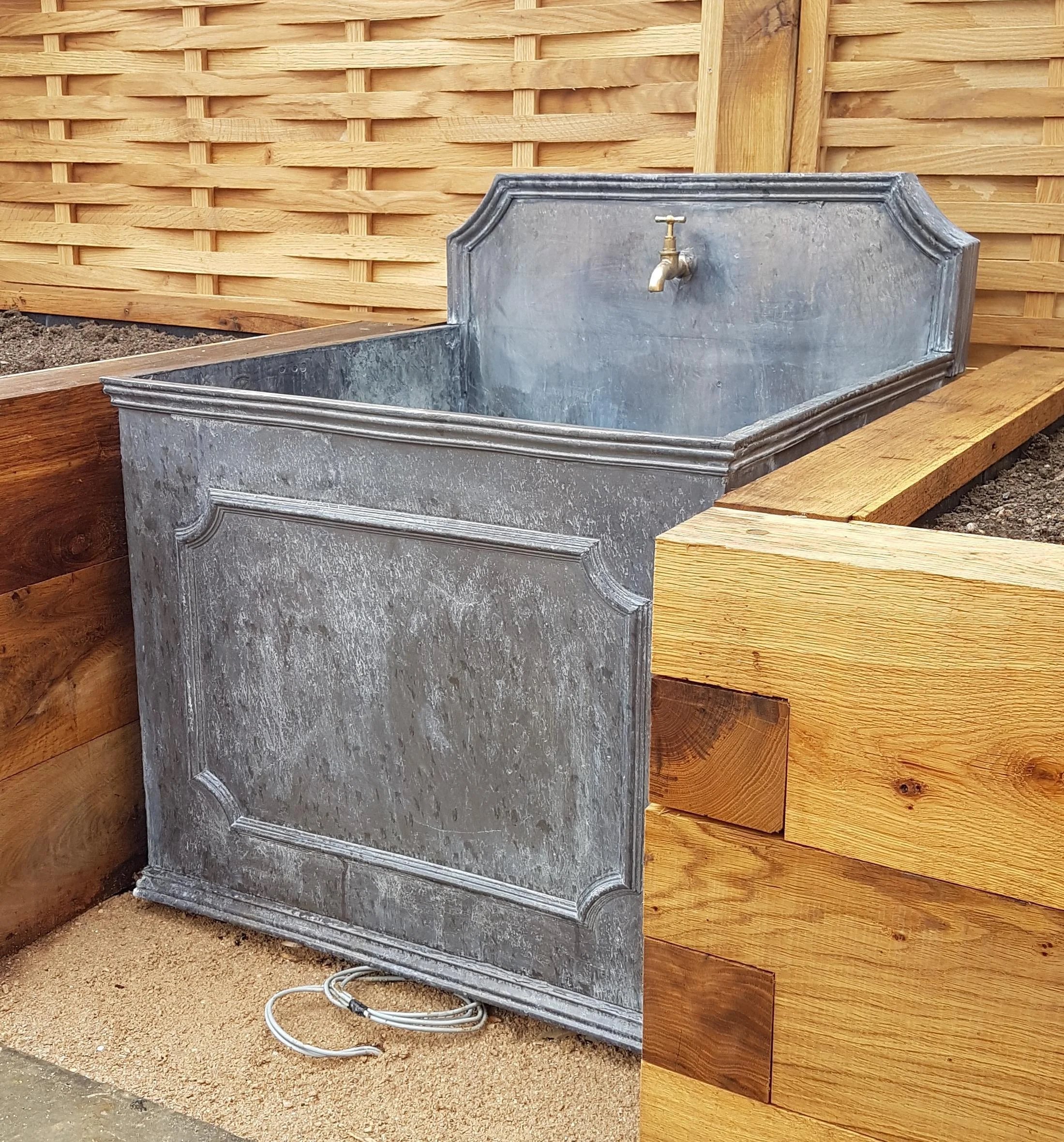 Cistern with Tap