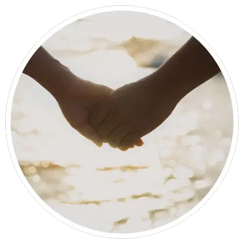 Holding hands, offering support to each other in addiction depression - Healing Family Addiction