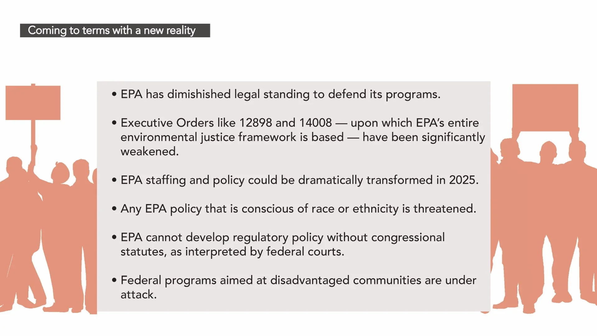 Silhouettes of people holding protest signs in front of a text-filled slide titled 'Coming to terms with a new reality'.