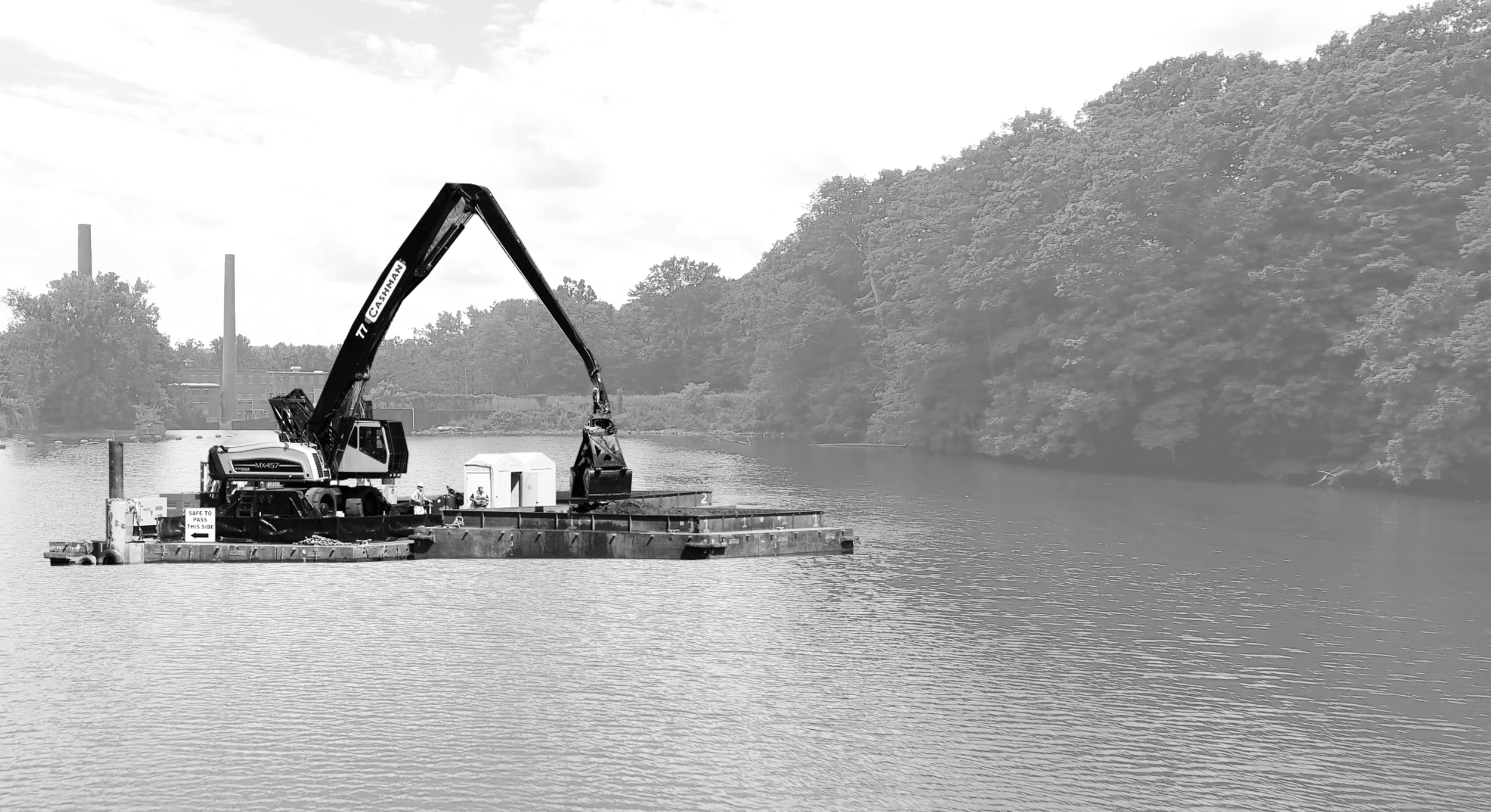 A mechanical PCB dredging operation imagined on Rising Pond in Great Barrington, Massachusetts.