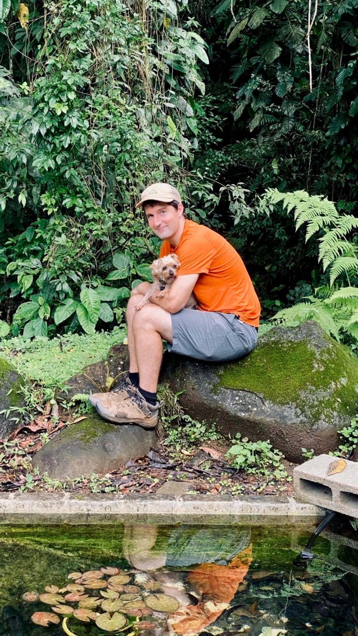 Brian and Ruben the yorki-poo at the reflecting pond in Costa Rica.