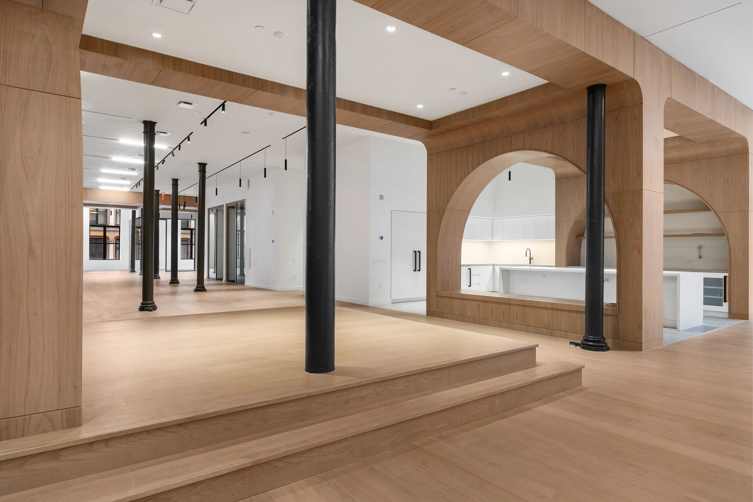 office space with millwork and glass office fronts