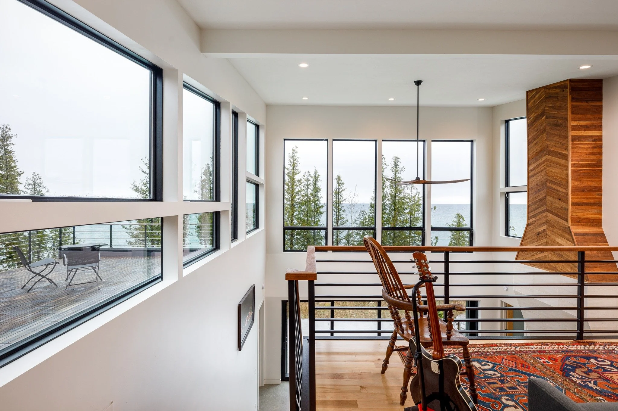 waterfront-home-design-loft-wood-floor-water-view.jpg