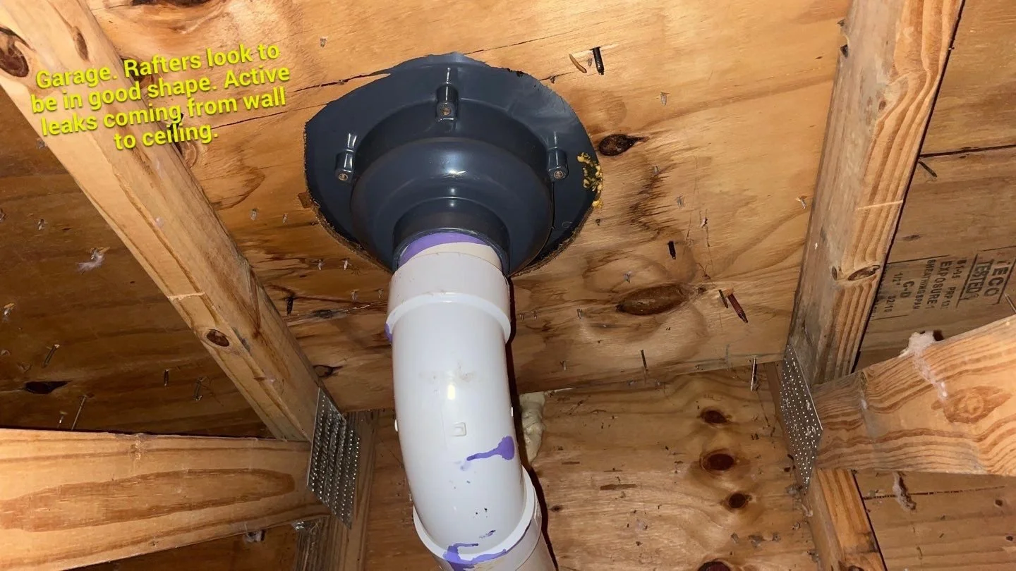 HOUSE Leak over Garage North Side of House near NW corner CEILING VIEW Rafters good shape.JPEG