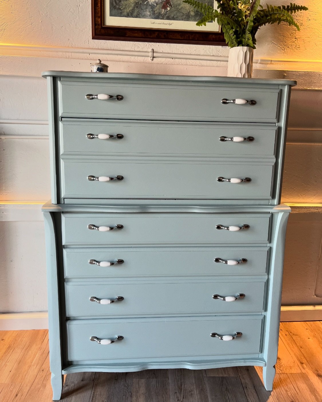 🩵 Available 🩵 We updated this solid wood dresser by giving it a coat or blue paint and adding some stylish hardware. Take her home today!