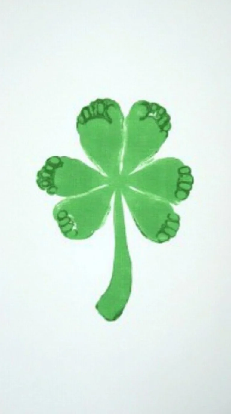 flat lay of a St. Patrick’s Day baby footprint craft.jpg
