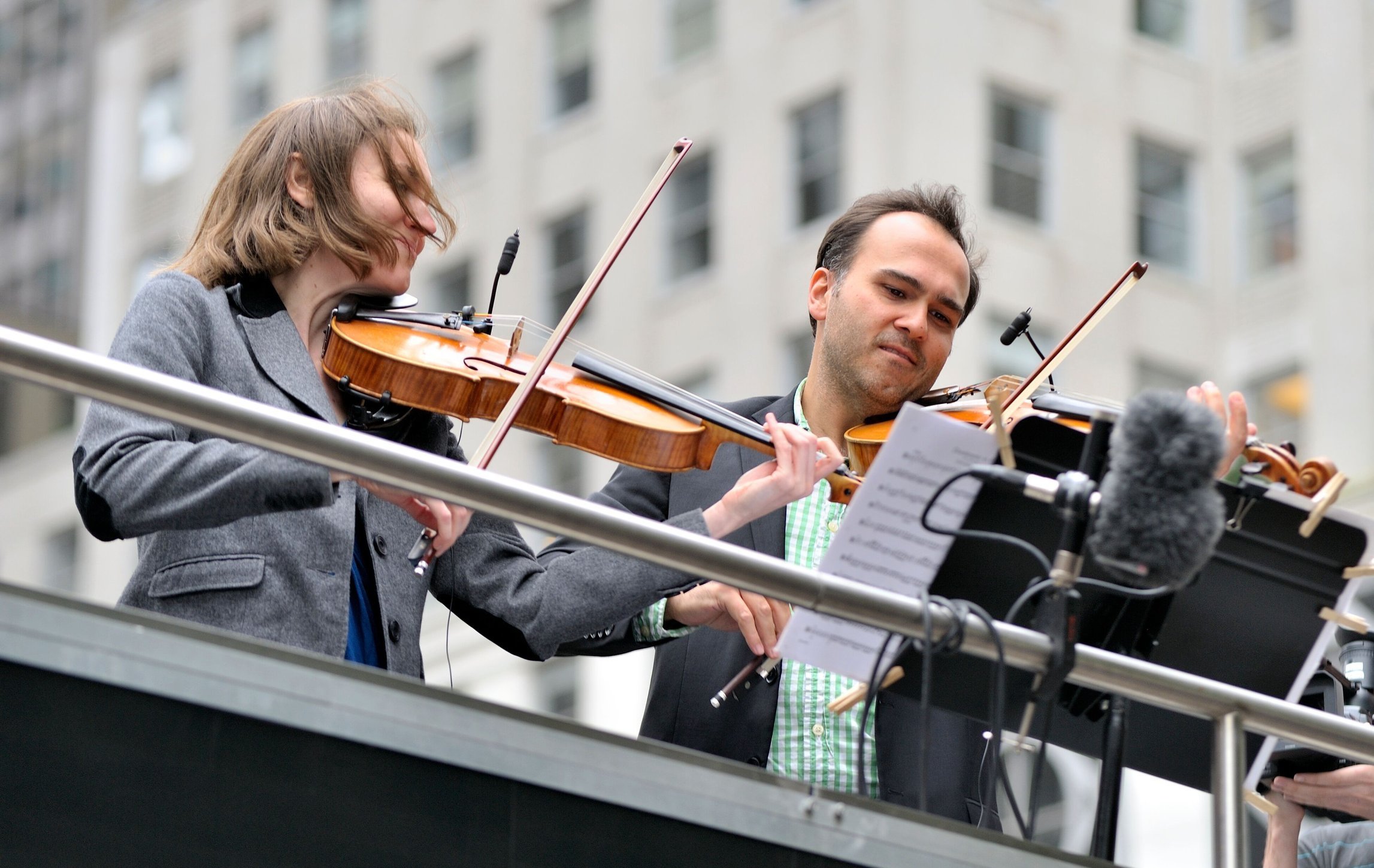 Performing on a double-decker bus in New York City