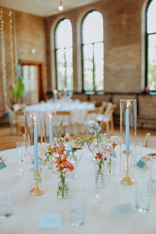 Table with bud vases and taper candles