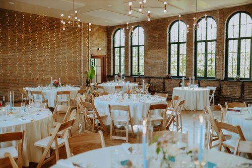 Wide bright & airy industrial reception room shot