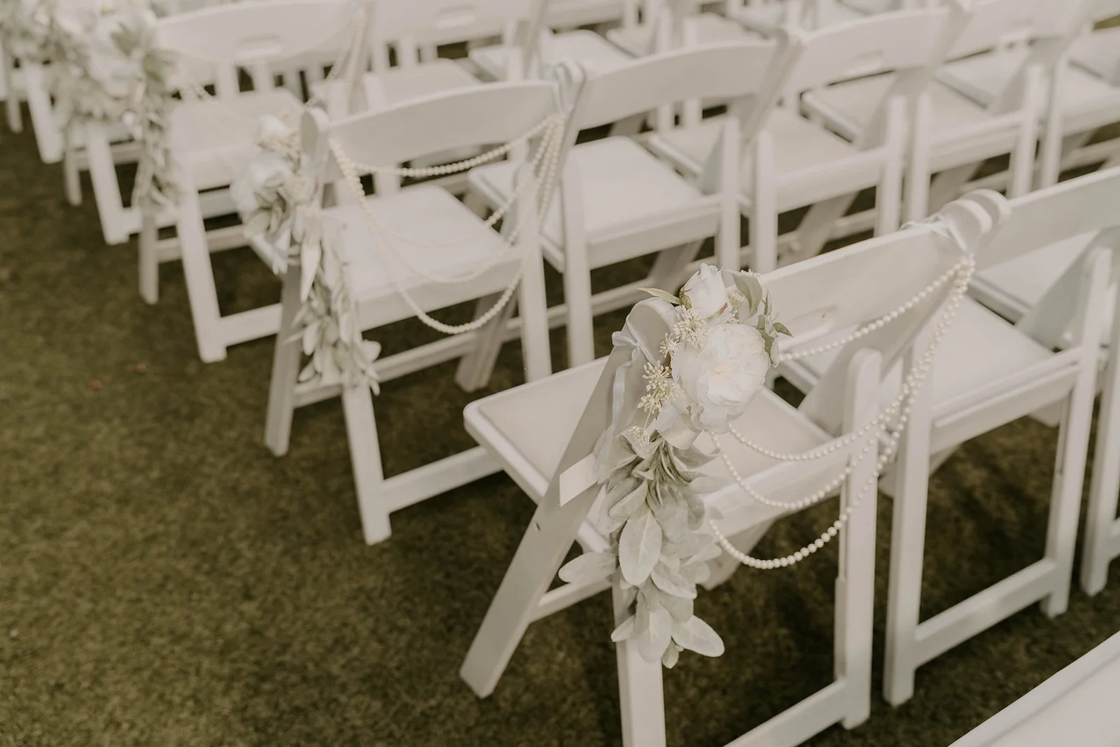 ceremony_chairs_pearl_draping.jpg