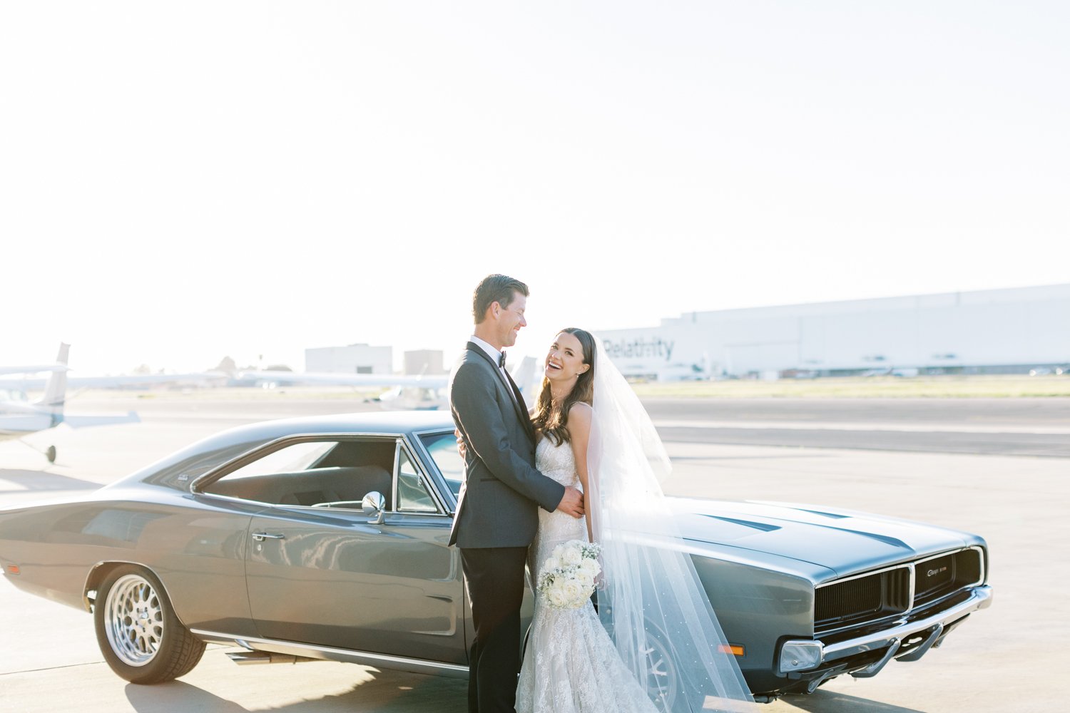 Wedding at the Modern Long Beach- airplane tarmac