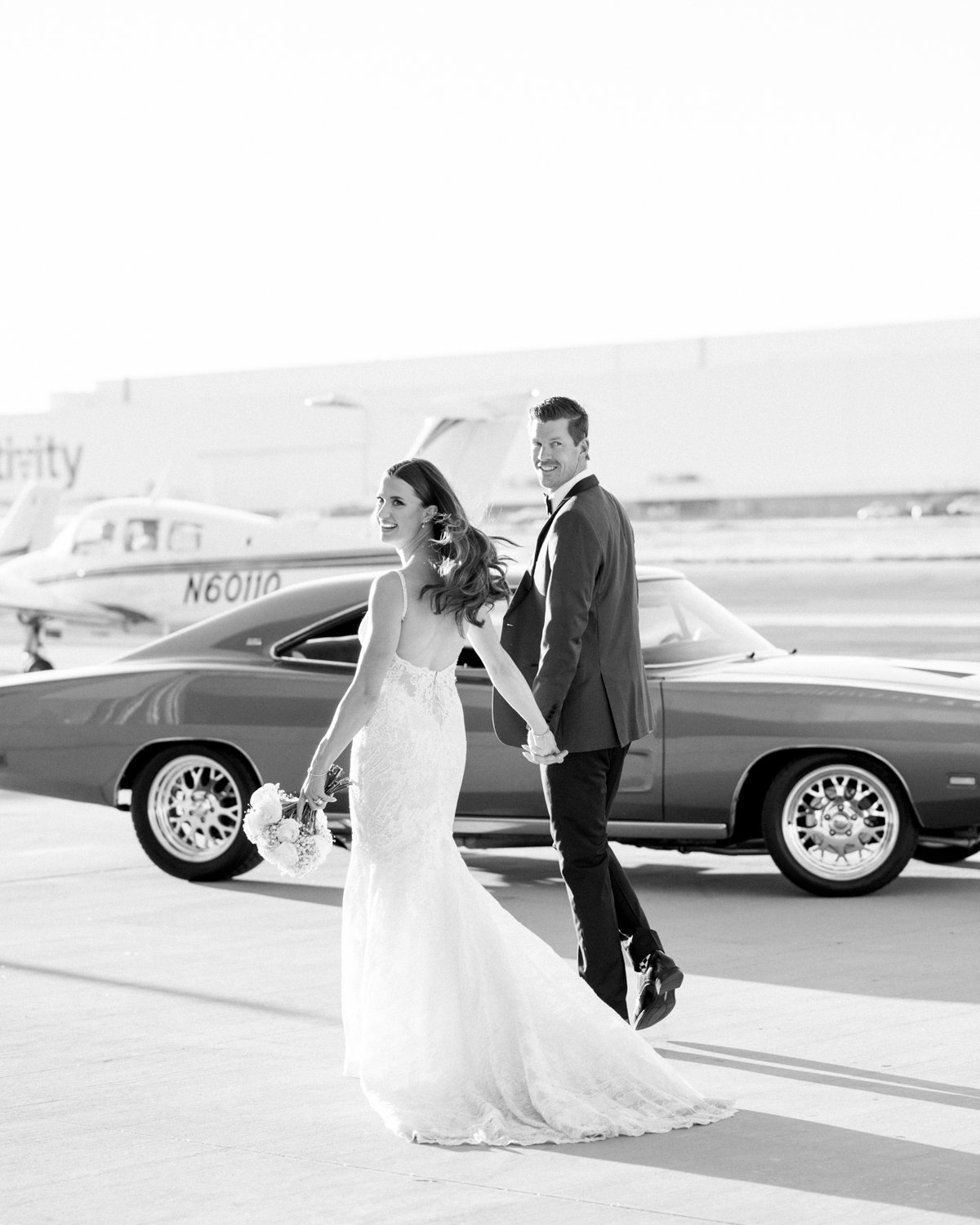 Wedding at the Modern Long Beach- airplane tarmac