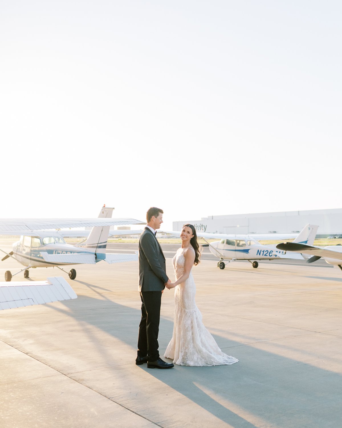 Wedding Photos on airplane tarmac- the modern Long beach