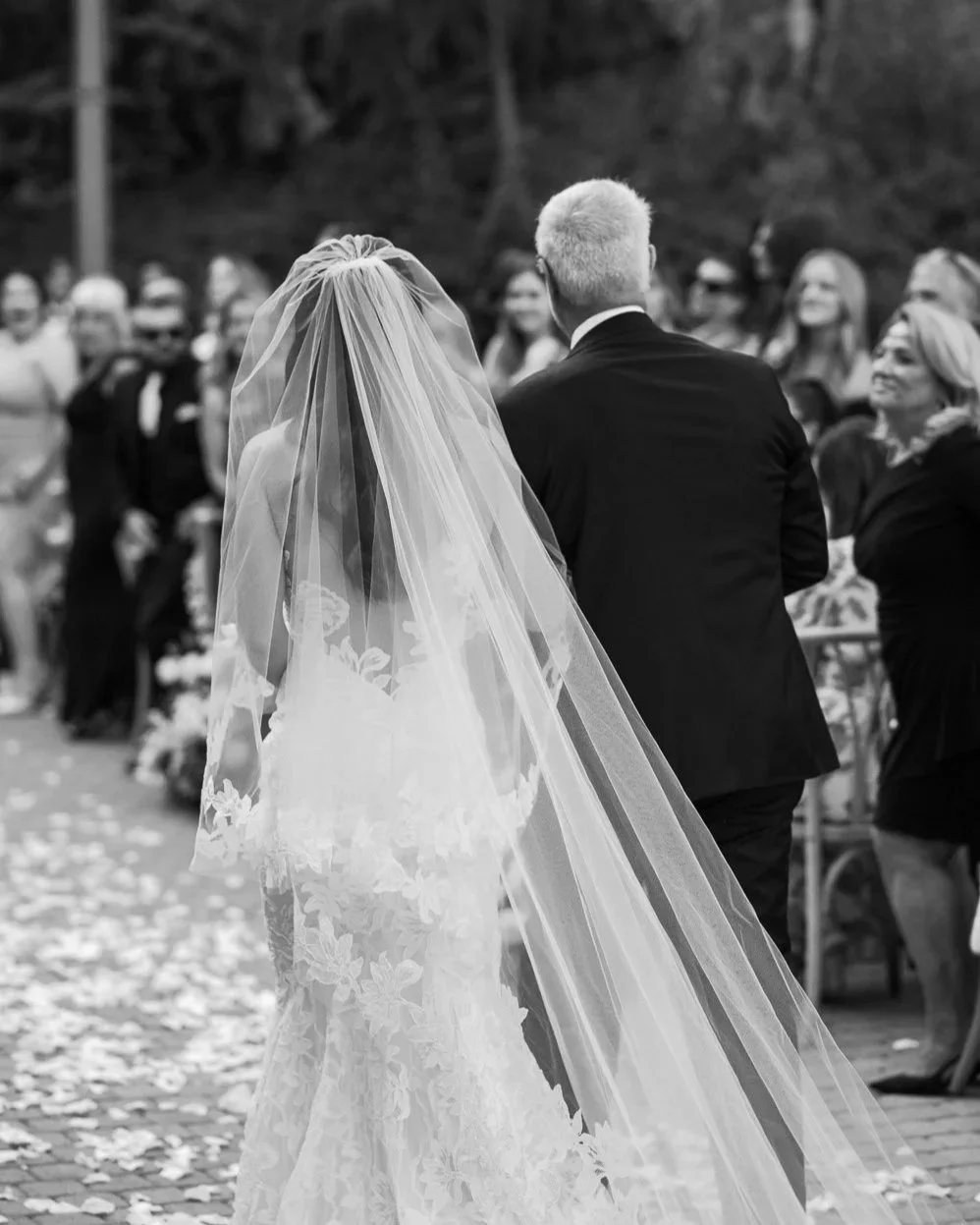 Bride Walks down the aisle with her dad at an Orange County Wedding at the Ranch in Laguna Beach