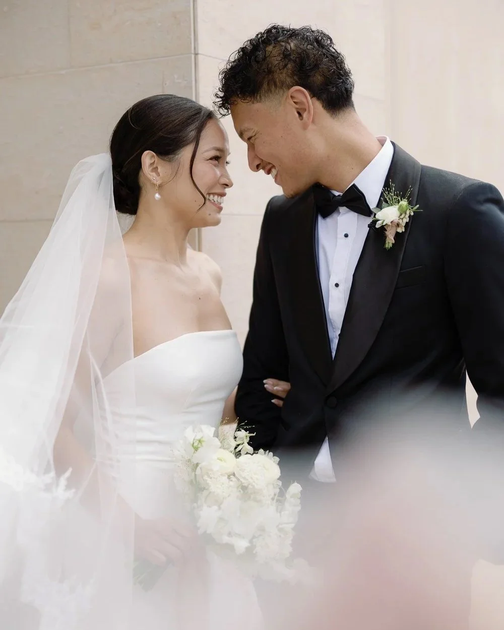 Bride and groom pose for photos during their orange county wedding at Grand Gimeno in Orange. 