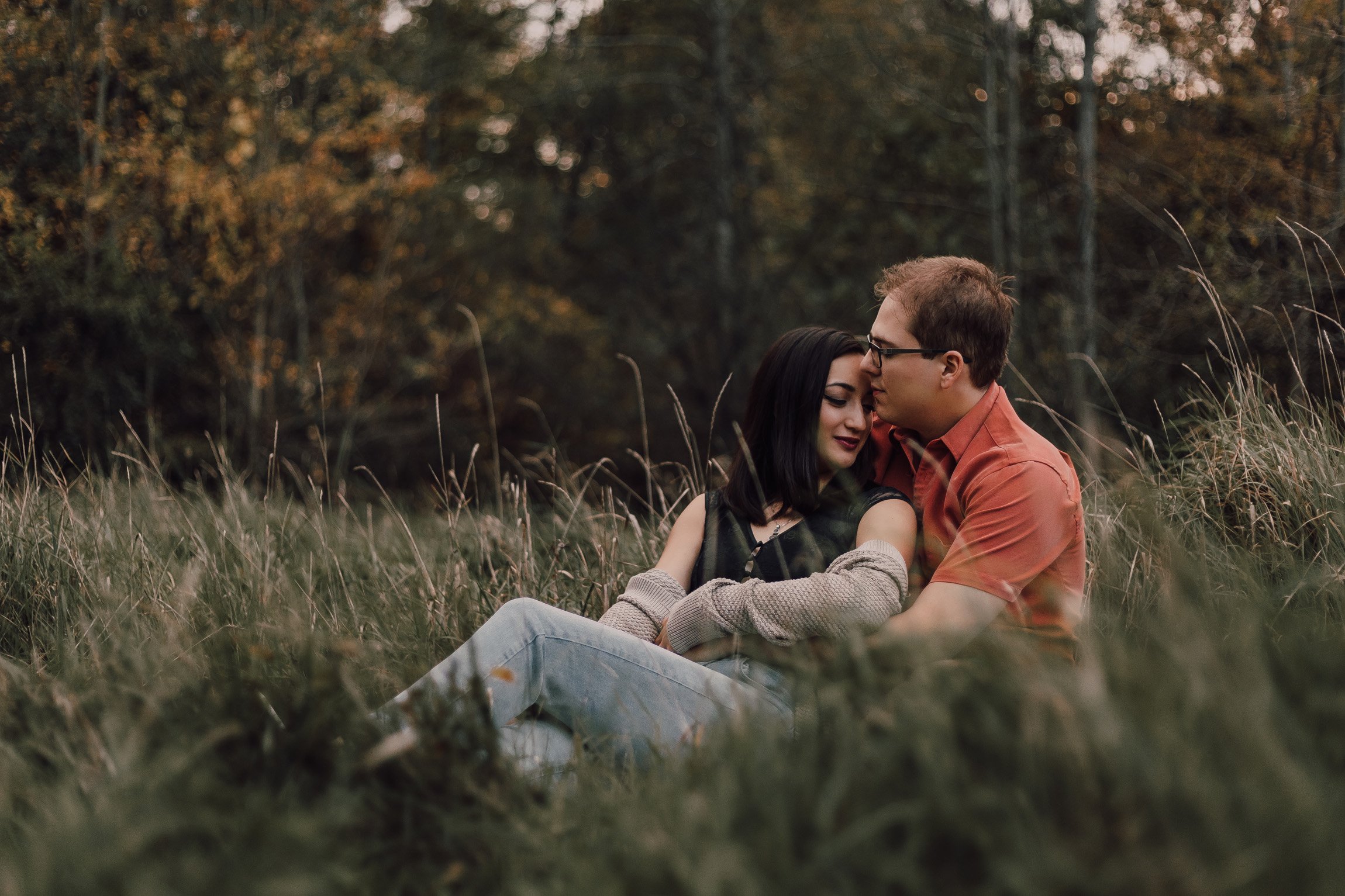 outdoor engagement photography in a field