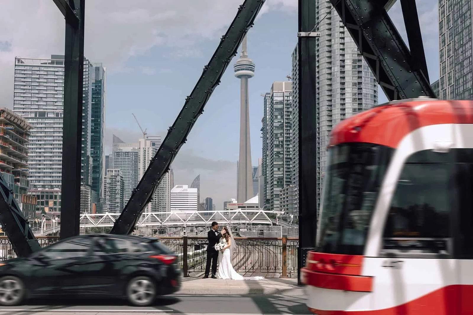 Toronto streetcar wedding photography on Bathurst bridge
