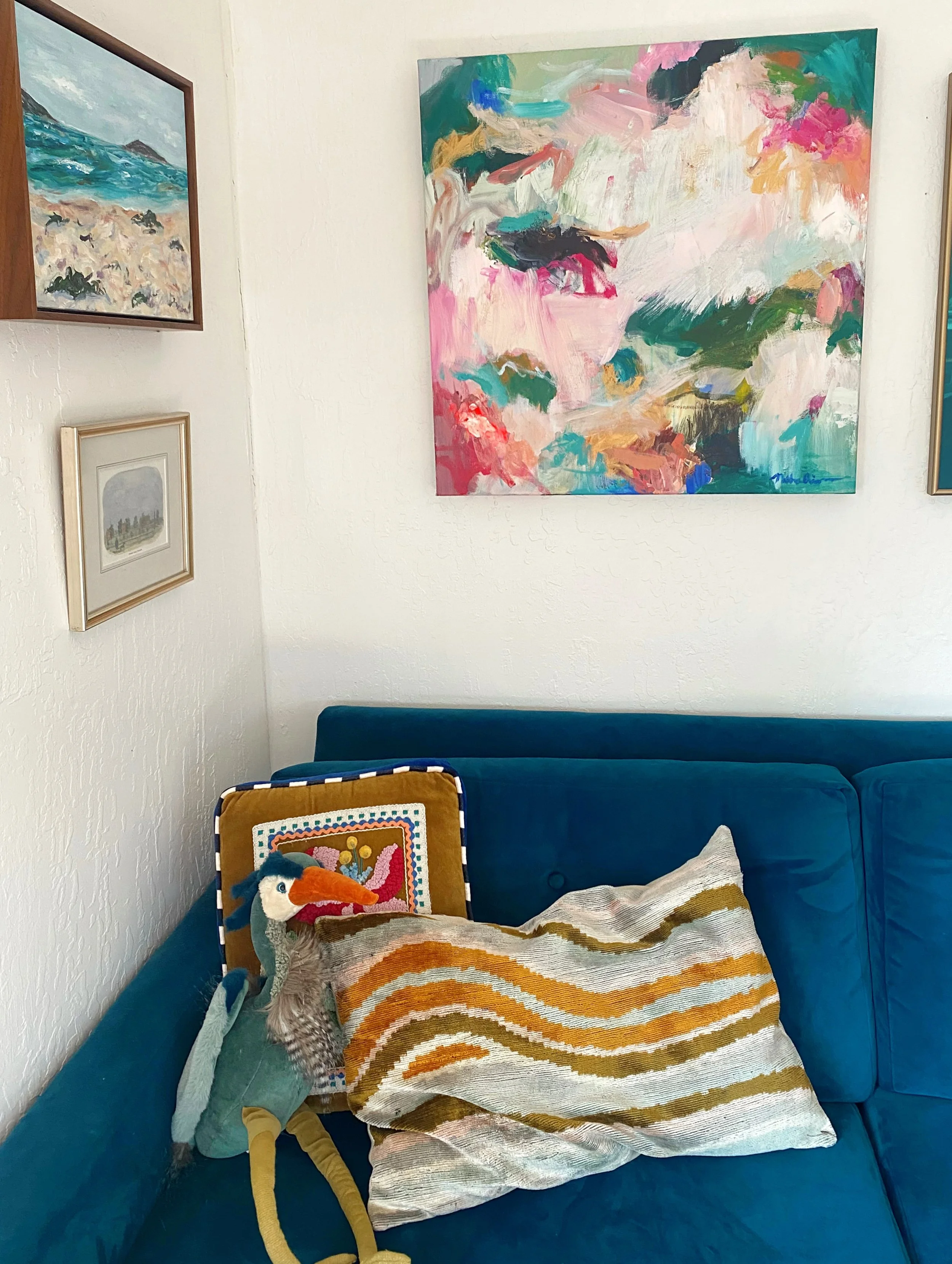 who says stuffed animals are only for children?!😆😇 this is Henry (the Heron) chilling under my paintings, &ldquo;Champaign on the Bay&rdquo; and &ldquo;The Way Life Should Be,&rdquo; which you can find prints of in my Etsy shop &mdash; link in bio!