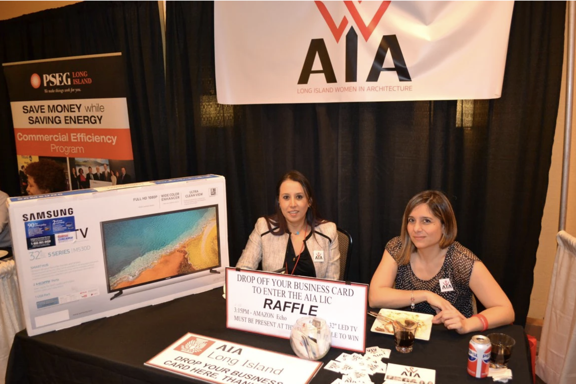  AIA Women in Architecture Committee at booth at Annual Product Fair 