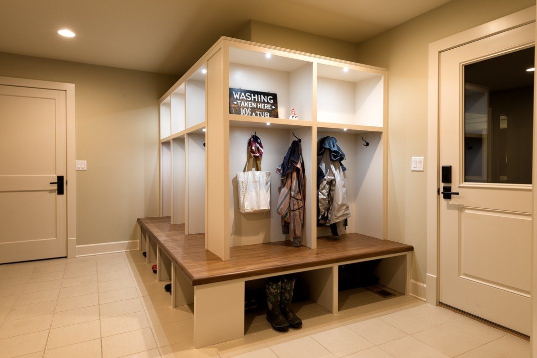 Having a mudroom with built-in locker storage is a game-changer! It keeps everything organized and easily accessible, making hectic mornings a breeze. Plus, it adds a stylish touch to your home's entryway from the garage. 

Contact us today to get st