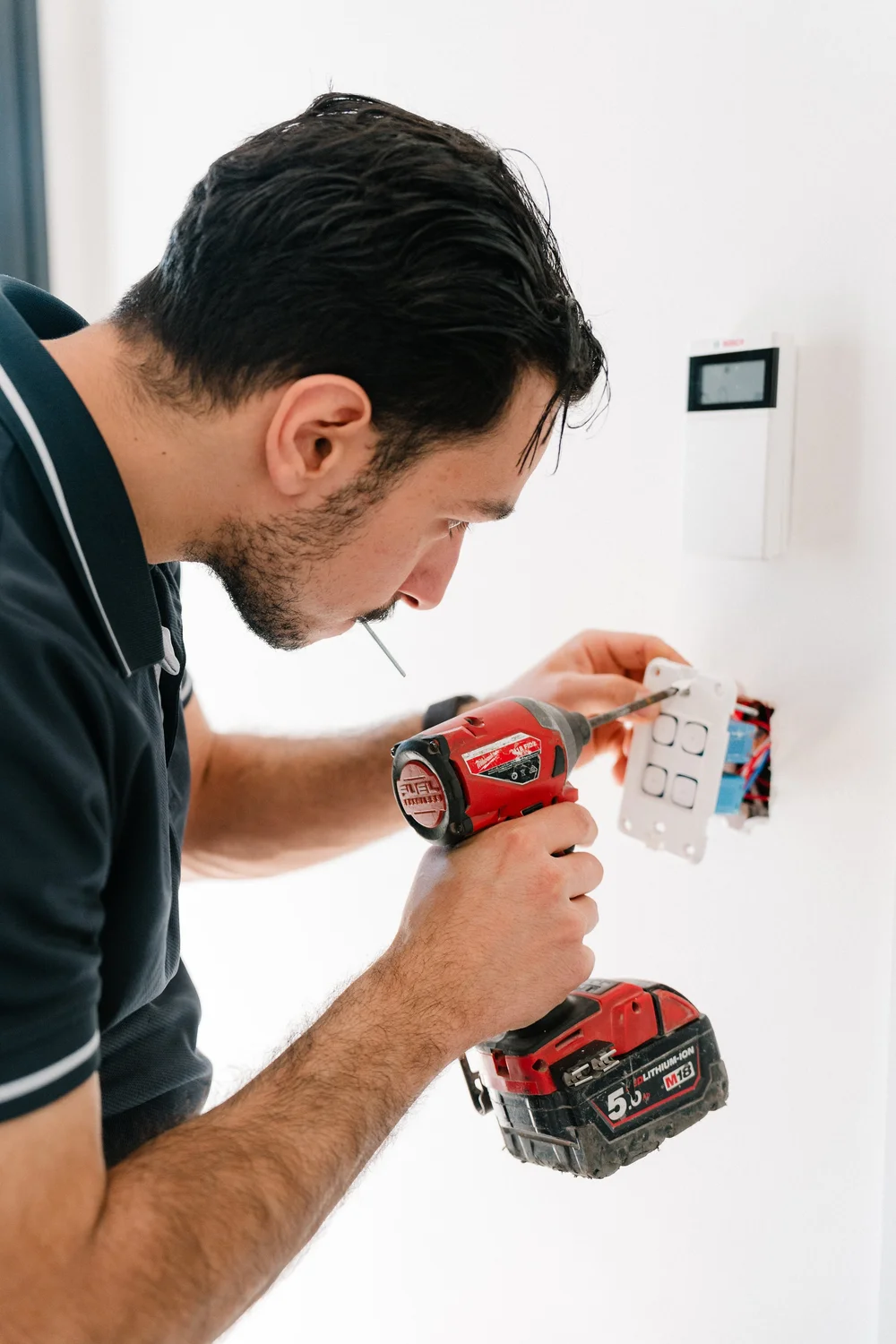 C-Bus eDLT Saturn switch installed Sydney home by Cync Electrical