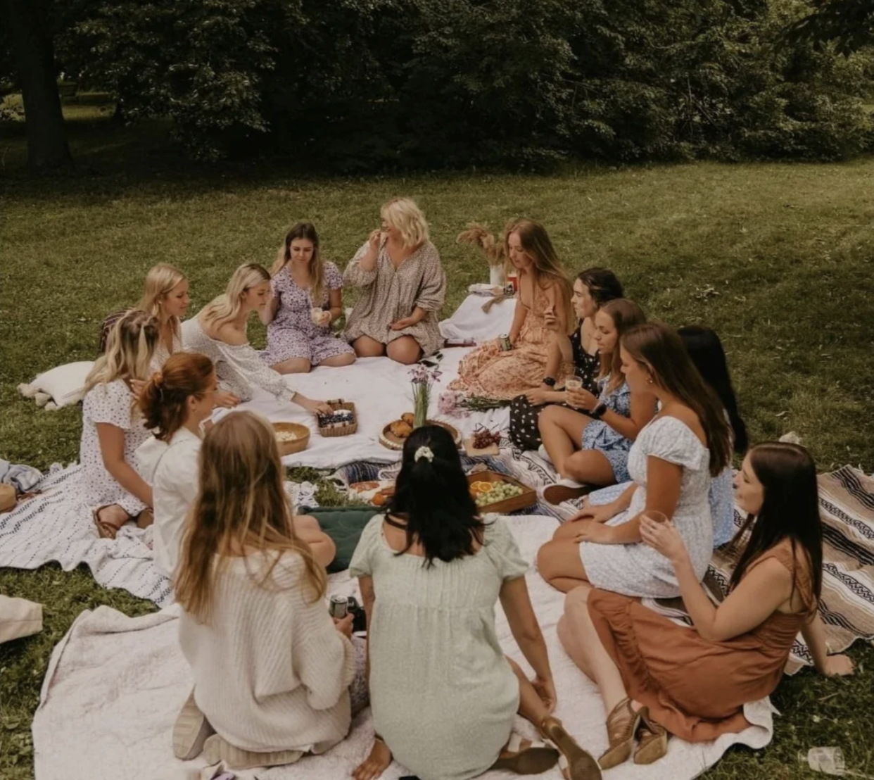 women sitting in circle in nature