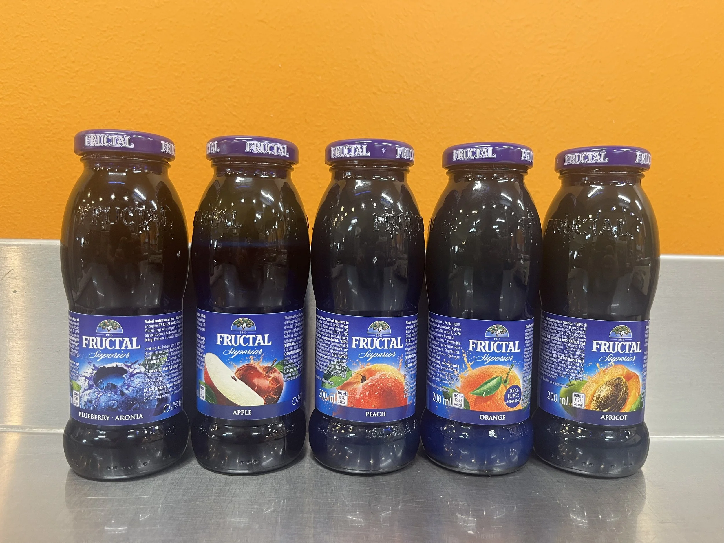 Fructal 200ml glass juice bottles. Chilled, ready to consume in a variety of flavours.